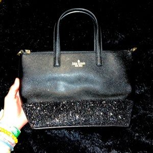 Never been used mini Kate spade purse has the overbody strap